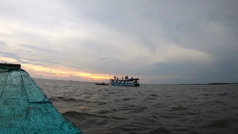 Time lapse shot of sunset at Siem Reap Tonle Sap Kompong Phluk, Cambodia Stock Footage 108198794