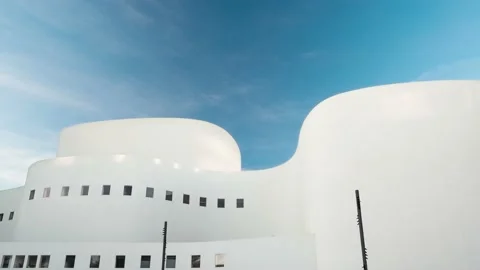 Time lapse shot of a theater while a airplane passes by Stock Footage 219572276