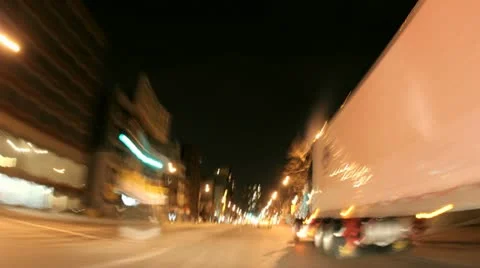 A time lapse shot through a busy downtown city street at night. 库存影片 11518889