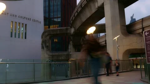 Time-lapse shot of tourists walking on an urban skywalk in Bangkok Stock Footage 323902002