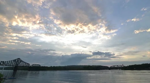 Time Lapse Shot of Train Bridge and Water down on the River Stock Footage 58015048