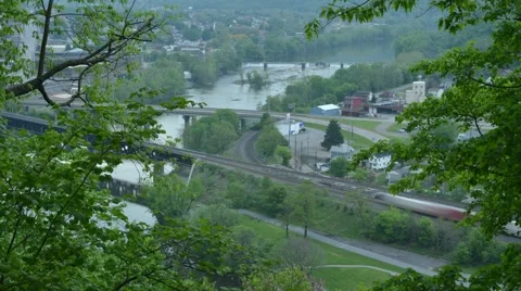 Time Lapse Shot of a Train Crossing Bridge in Beaver Falls, PA Stock Footage 58225514