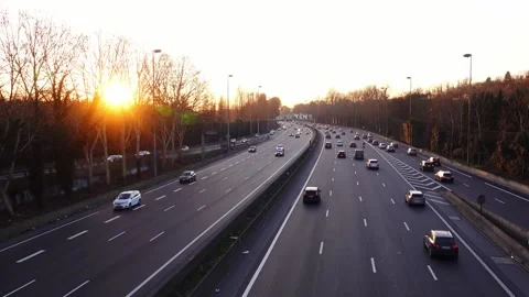 Time lapse shot of vehicles driving on highways in Paris, France at sunset Stock Footage 151235139