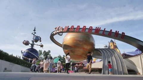 Time lapse shot of visitors or tourists  walking in Disney land Stock Footage 124695089