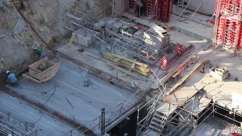 Time lapse shot of workers building a large scale construction Stock Footage 72111349