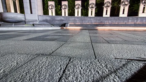 Time lapse shot of World War II Memorial tilting up, night Stock Footage 99429829