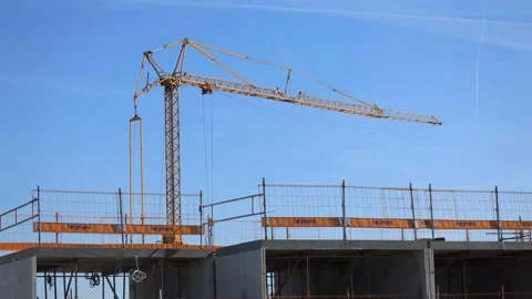 Time lapse showing construction work with small crane adding floor Stock Footage 199051901
