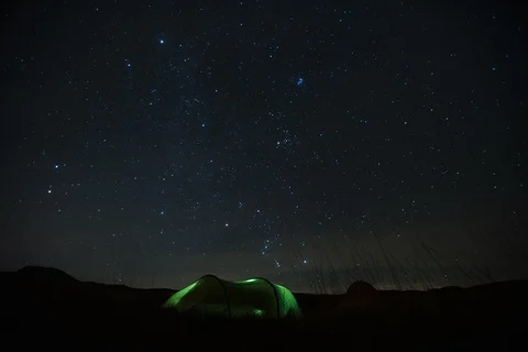 A time lapse showing the night sky over the Galloway forest, Scotland Stock Footage 96499428