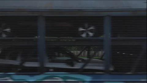 Time lapse. Side view from moving train to another train transporting cars Stock-Footage 250197795