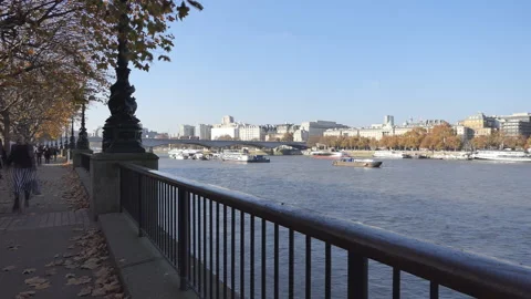 Time lapse. A sidewalk on the riverside in autumn. Stock Footage 115955704