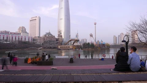 Time lapse sightseeing people on observation platform against Lotte World Tower Stock Footage 100270434