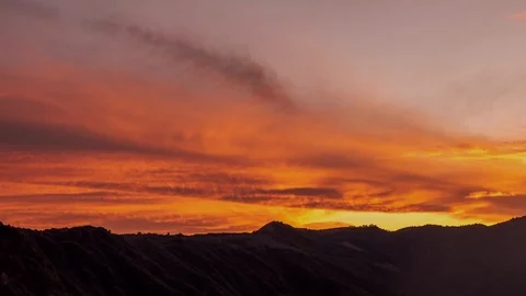Time lapse silhouettes of the mountain red sunset Stock Footage 125128752