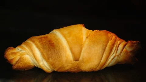 TIME-LAPSE: Single Croissant bake in oven Stock Footage 99082780