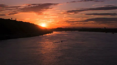 Time lapse. Сity Sunset over the hills and river with moving clouds 스톡 동영상 64269846