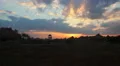 Time-lapse, sky above old farm in countryside. Beautiful sunrise HD Footage