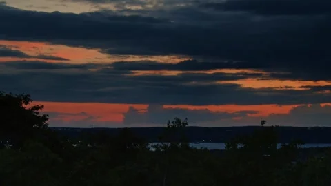 Time lapse of sky after sunset with clouds and orange sky Stock Footage 278907525