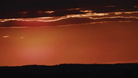 Time lapse of sky after sunset with clouds and orange sky Stock Footage 278907638