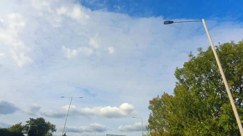 Time Lapse. Sky and Clouds During Car Drive over England GB UK Stock Footage 321849574