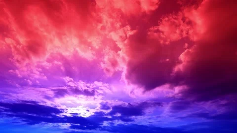 Time lapse of the sky with blue and red colored clouds. Stock Footage 170436905