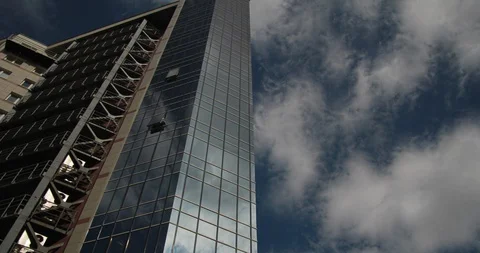 Time lapse Sky Building  4K full ProRes 422 HQ Stock Footage 129793815