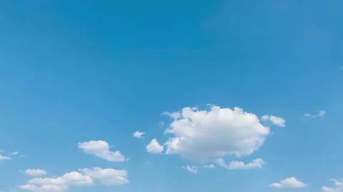 Time lapse of sky in the day time, blue sky white clouds background Stock Footage 169081400