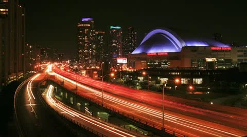 Time lapse of the Sky Dome beside the Gardiner Expressway in downtown Toronto Stock Footage 11237414