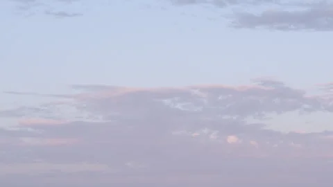 Time lapse of the sky during sunset, clouds rolling past contrasting colors Stock Footage 262574409