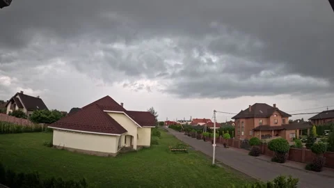 Time lapse of sky, floating clouds above countryside or town Stock Footage 304956170
