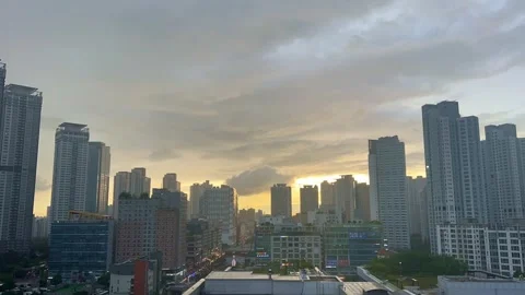 Time Lapse, Sky in a High-Rise Housing Complex on a Cloudy Day Stock Footage 248700090