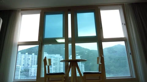 Time lapse of sky mountain river and cloud ladscape trhough window Stock Footage 251435436