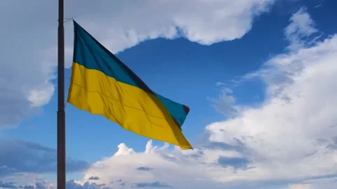 Time Lapse Sky Movement with Ukrainian Flag.  Stock Footage 231752776