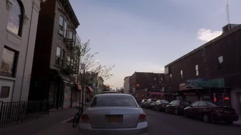 Time lapse. Sky over Greenpoint. Meserole Ave. Brooklyn. New York. Stock Footage 77877211