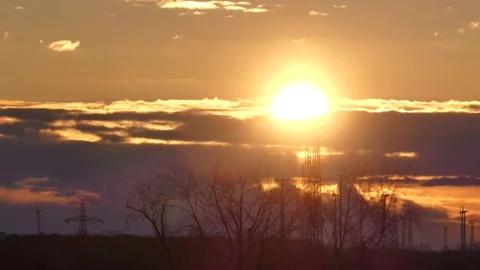 Time lapse sky - trees, power poles, wind turbines - sunbeams, clouds, backgound Stock Footage 151902442