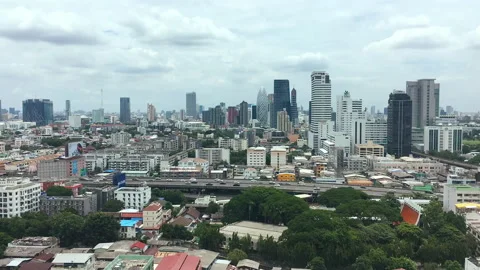 Time lapse of skyscraper and high way with cloud and blue sky Stock Footage 138756050