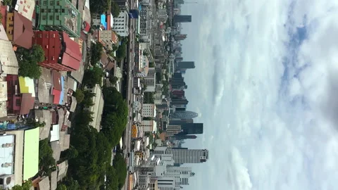 Time lapse of skyscraper and high way with cloud and blue sky, vertical video Stock Footage 138756066