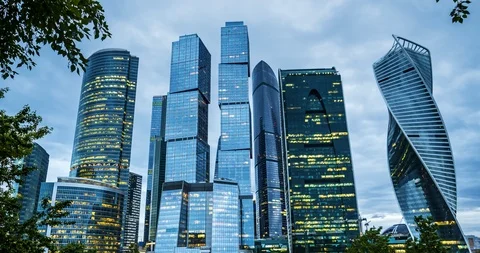 Time-lapse skyscraper in the city under floating clouds Stock Footage 86450361