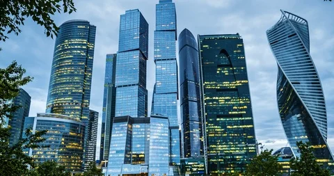 Time-lapse skyscraper in the city under floating clouds Stock Footage 86450386