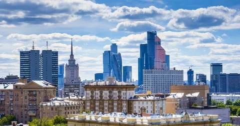 Time-lapse skyscraper in the city under floating clouds Stock Footage 86450502