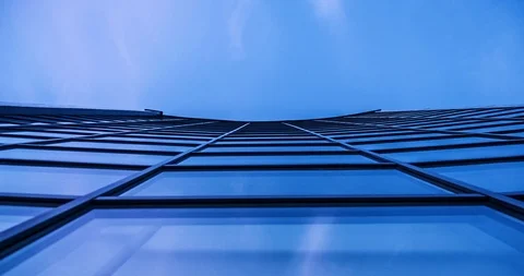 Time-lapse skyscraper in the city under floating clouds Vídeo Stock 86450692