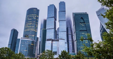 Time-lapse skyscraper in the city under floating clouds Stock Footage 86450780