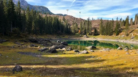 Time Lapse of a small alpine Lake Carezza o Karersee, Dolomites, Italy Stock Footage 118273127