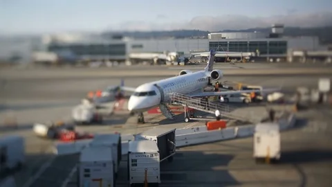 Time Lapse of Small Jet Aircraft at Airport Видео 77696364