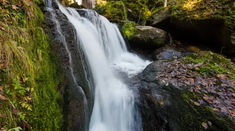 Time Lapse - Small river in fall, small waterfall Видео 58654739