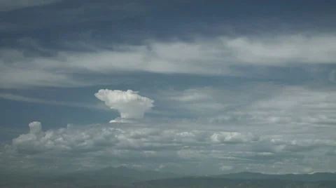 Time Lapse of Small Thunderstorms Growing Larger over Rocky Mountains Stock Footage 54746541