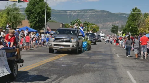 Time lapse-Small town 4th of July parade throwing candy to kids Stock Footage 64896046