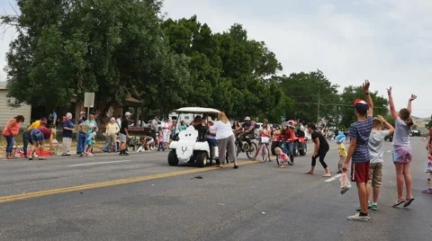 Time lapse-Small town summer celebration tractors on parade Stock Footage 65216649