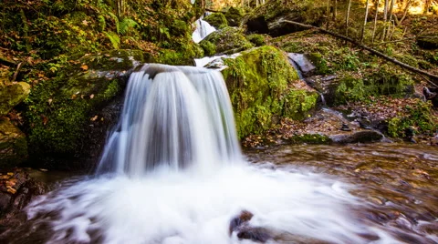 Time Lapse - Small Waterfall in fall 스톡 동영상 58656921
