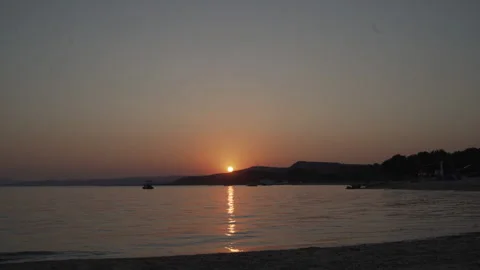 Time-lapse of small waves in the evening. Long shot time lapse of sea waves in Stock Footage 147406597