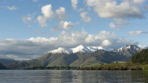 Time-lapse of snow-capped mountains behind Lake Wanaka, Otago, New Zealand. Stock Footage 133151801