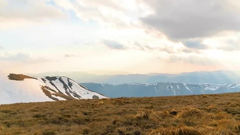 Time lapse of snow-capped mountainside at sunset Stock Footage 119081639